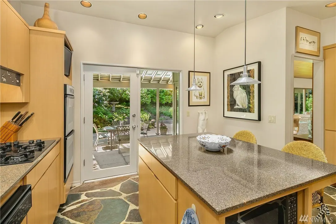 Cannon Remodel: kitchen island and garden view