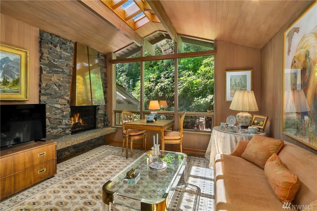 Cannon Remodel: den with stone fireplace and skylight