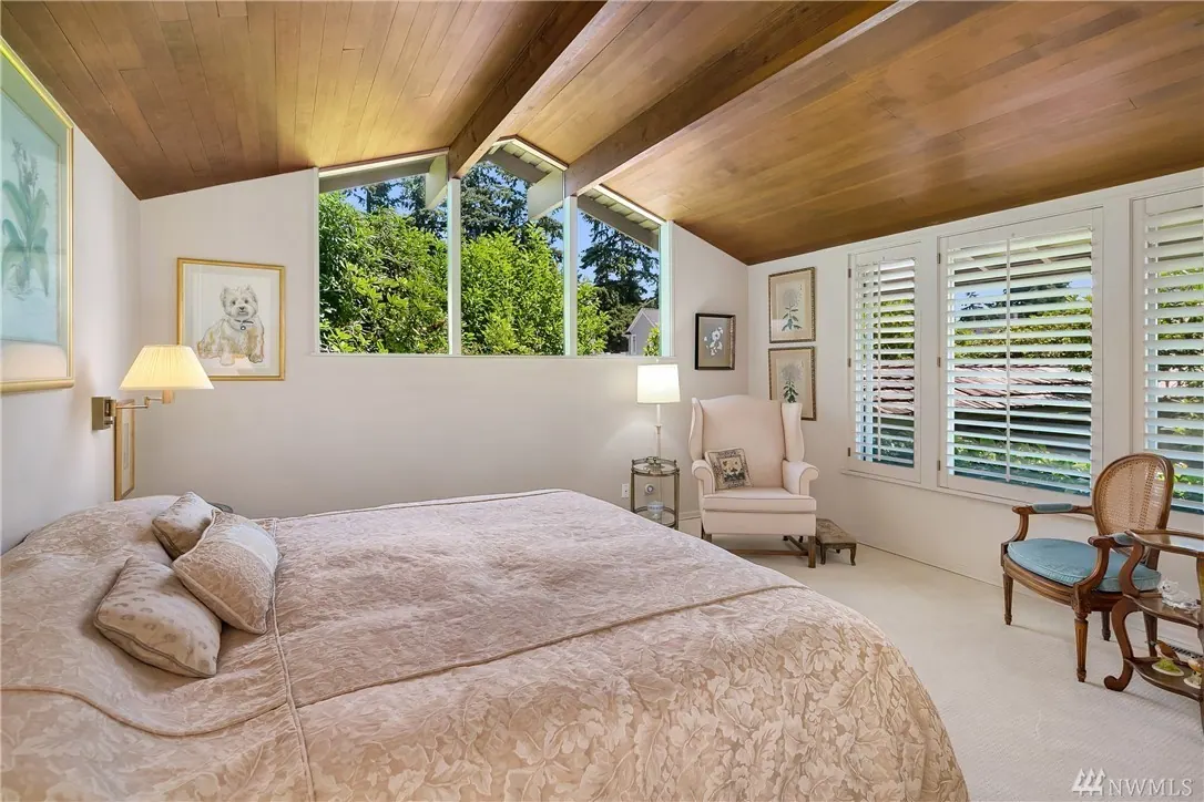 Cannon Remodel: primary bedroom under a cedar ceiling